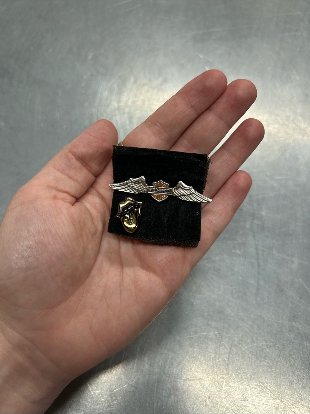 Harley-Davidson and Rolling Stones pins